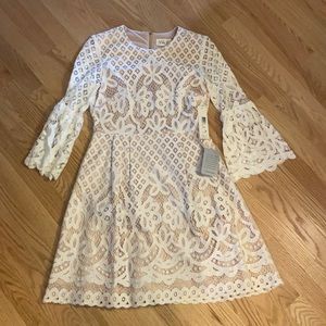NWT. Eliza J white lace overlay dress with tan lining.